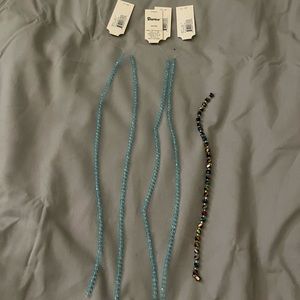 Darice blue and multi-colored glass beads for crafting